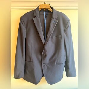 Twillory
Men's performance blazer, easily packs for travel, built in pocket